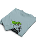 Folded front view of the Agave Dinosaur Motivation men’s heavyweight long-sleeve tee, showing its single green dinosaur and running quote front print.