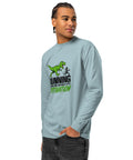 Angled model front view of the Agave Dinosaur Motivation men’s heavyweight long-sleeve tee, showing its single green dinosaur and running quote front print.