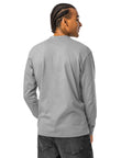 Model view of the unprinted back of the Carbon Grey Dinosaur Motivation men’s heavyweight long-sleeve tee, with no back print.
