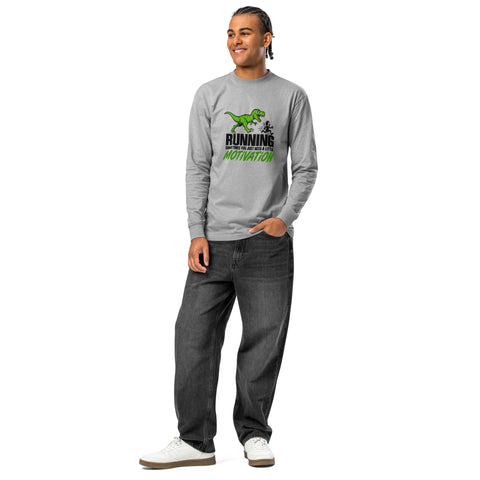 Full-length model front view of the Carbon Grey Dinosaur Motivation men’s heavyweight long-sleeve tee, showing its single green dinosaur and running quote front print.