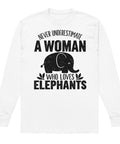 Never Underestimate a Woman Who Loves Elephants white heavyweight long sleeve tee with large black elephant graphic – front flat lay