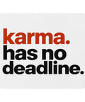 White mouse pad with rust-orange and black Karma Has No Deadline lettering centred on the surface – ZIPZAPPA