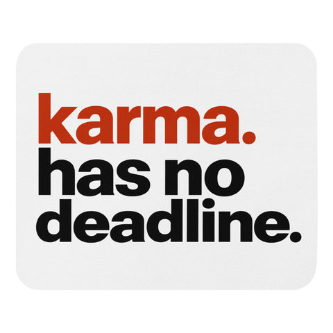 White mouse pad with rust-orange and black Karma Has No Deadline lettering centred on the surface – ZIPZAPPA