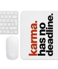 White mouse pad with rust-orange and black Karma Has No Deadline lettering centred on the surface – ZIPZAPPA