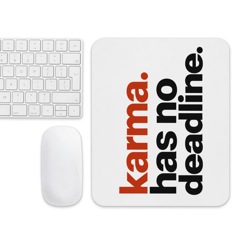 White mouse pad with rust-orange and black Karma Has No Deadline lettering centred on the surface – ZIPZAPPA