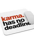 White mouse pad with rust-orange and black Karma Has No Deadline lettering centred on the surface – ZIPZAPPA
