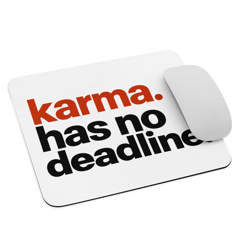 White mouse pad with rust-orange and black Karma Has No Deadline lettering centred on the surface – ZIPZAPPA