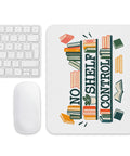 White mouse pad with deep-green No Shelf Control lettering, colourful books and a small potted plant centred on the surface – ZIPZAPPA