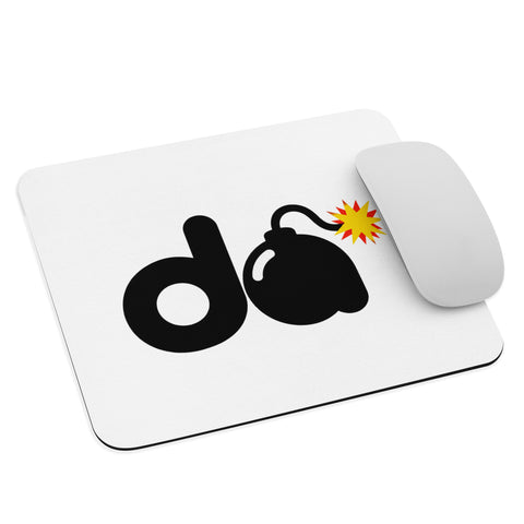 White mouse pad with original bold black d and cartoon bomb with a red-and-yellow fuse spark, centred on the surface – ZIPZAPPA