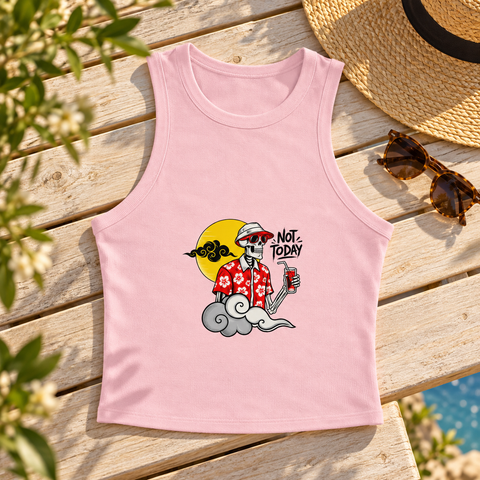 Pink Not Today women’s racer tank laid on a sunlit wooden terrace bench beside sunglasses and a straw hat, showing one tropical skeleton front print.