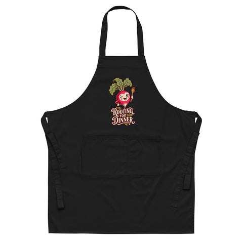 Black organic cotton apron with a cheerful radish and Rooting for Dinner front illustration.