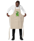 Man wearing a Rope organic cotton apron with green leafy Earth artwork and Go Green lettering above a two-compartment pocket.