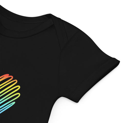 Close-up of the black Rainbow Heart bodysuit shoulder and rainbow front print.