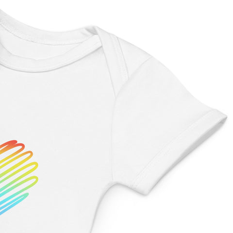 Close-up of the white Rainbow Heart bodysuit shoulder and rainbow front print.