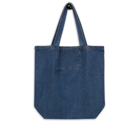In the Mirror I See Potential organic denim-blue tote bag with large chess pawn and king illustration – back flat lay