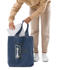 In the Mirror I See Potential organic denim-blue tote bag with large chess pawn and king illustration – front detail