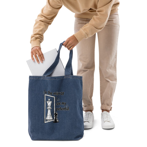 In the Mirror I See Potential organic denim-blue tote bag with large chess pawn and king illustration – front detail