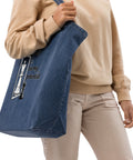 In the Mirror I See Potential organic denim-blue tote bag with large chess pawn and king illustration – right front detail