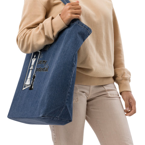 In the Mirror I See Potential organic denim-blue tote bag with large chess pawn and king illustration – right front detail