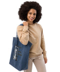 In the Mirror I See Potential organic denim-blue tote bag with large chess pawn and king illustration – right front angle