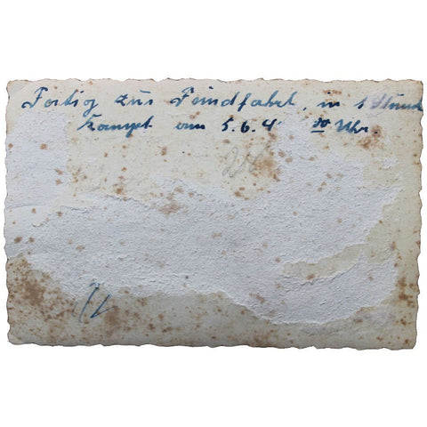 Photograph of German Soldiers in a Military Vehicle – WWII Era