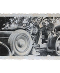 Photograph of German Soldiers in a Military Vehicle – WWII Era