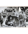 Photograph of German Soldiers Inspecting a Damaged Tank – WWII Era