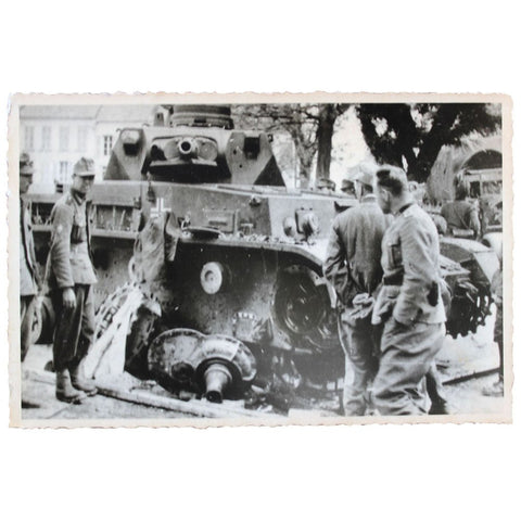 Photograph of German Soldiers Inspecting a Damaged Tank – WWII Era