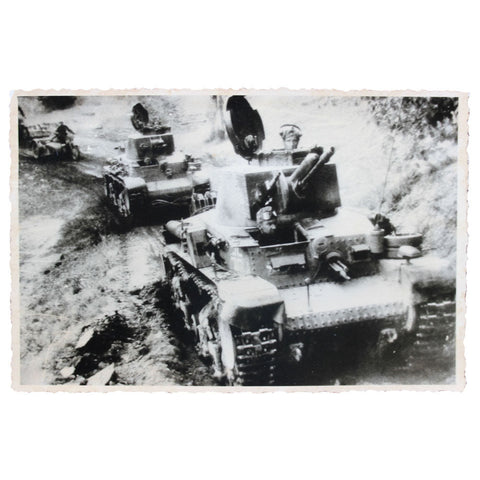 Photograph of German Tanks Advancing Through Rough Terrain – WWII Era