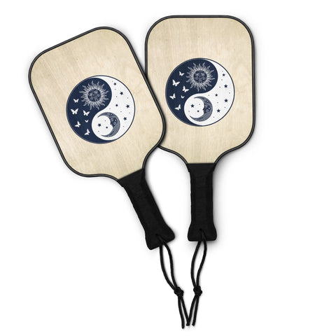 Celestial Balance wooden pickleball set with complete navy sun-and-moon yin-yang artwork on light paddles – view 2