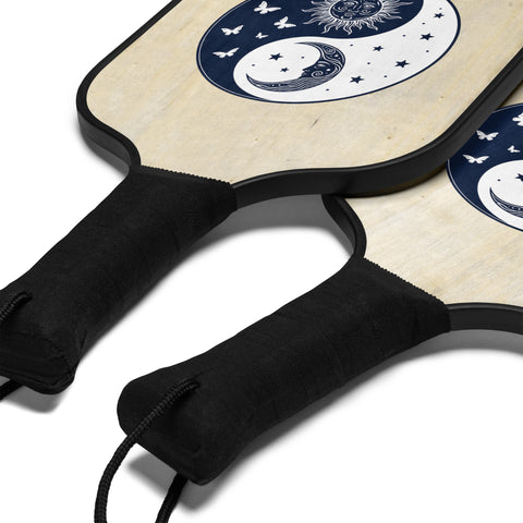 Celestial Balance wooden pickleball set with complete navy sun-and-moon yin-yang artwork on light paddles – product detail