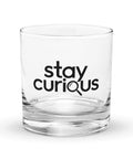 Clear 311 ml Stay Curious rocks glass with one black lettering and magnifying-glass print on the front, against a plain white background.