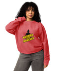 Second model wearing the crimson Buddha Is My Homeboy oversized cord sweatshirt with its single front print visible.