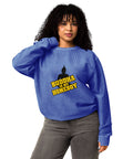 Second model wearing the royal blue Buddha Is My Homeboy oversized cord sweatshirt with its single front print visible.