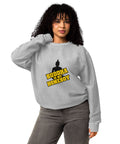 Second model wearing the silver Buddha Is My Homeboy oversized cord sweatshirt with its single front print visible.