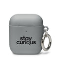 grey protective AirPods case, front with original black Stay Curious magnifying-glass lettering – ZIPZAPPA