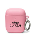 pink protective AirPods case, front with original black Stay Curious magnifying-glass lettering – ZIPZAPPA