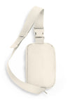 Plain ivory back of Karma Has No Deadline sling bag with adjustable strap