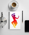 White spiral notebook with a centred classical dancer silhouette in purple, magenta, red, orange and yellow on the front – ZIPZAPPA