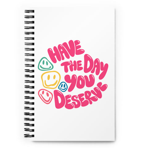 White spiral notebook with original pink Have the Day You Deserve lettering and colourful smiley faces centred on the front – ZIPZAPPA