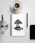 White spiral notebook with original black fisherman and tree standing on a giant fish island, centred in full on the front – ZIPZAPPA