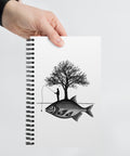 White spiral notebook with original black fisherman and tree standing on a giant fish island, centred in full on the front – ZIPZAPPA