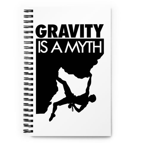 Original Gravity Is a Myth climber emblem on the front of a dotted spiral notebook – mockup 1 – ZIPZAPPA