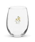 Golden Wildflowers 15 oz clear stemless wine glass – front with small complete mustard-yellow botanical illustration, view 1