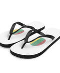 Lithuanian Fingerprint white flip-flops with red green and yellow prints and black straps – front-left view