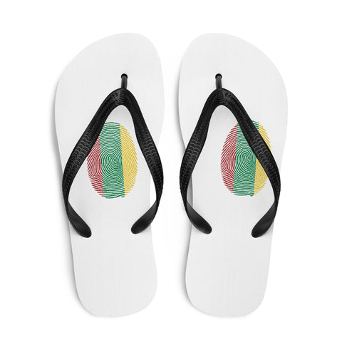 Lithuanian Fingerprint white flip-flops with red green and yellow prints and black straps – top view
