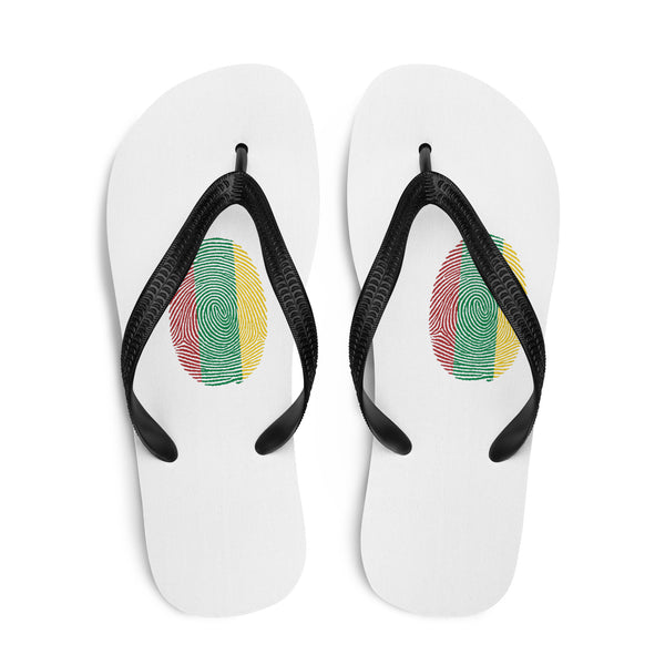 Lithuanian Fingerprint white flip-flops with red green and yellow prints and black straps – top view