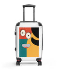 Colour Block Smile small hard-shell suitcase with full red, teal and yellow face graphic on white front – view 1