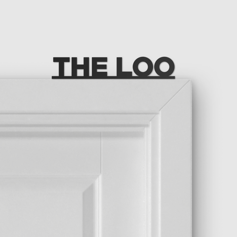 THE LOO door topper