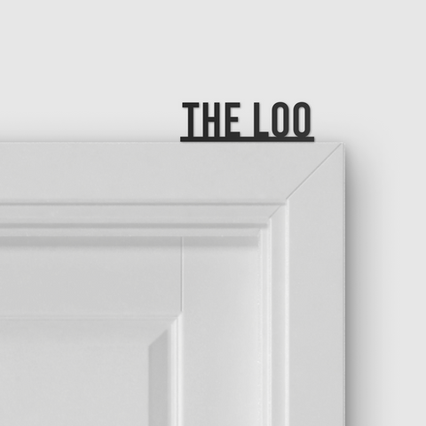 THE LOO door topper